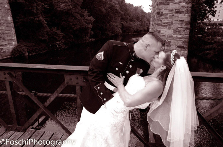 Foschi Marine and bride kiss