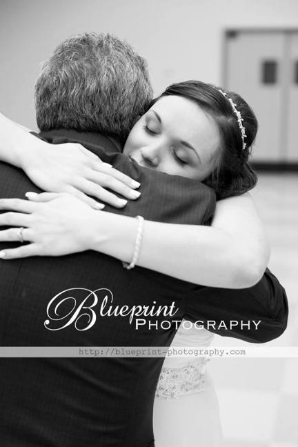 Blueprint photography jenga wedding hug father